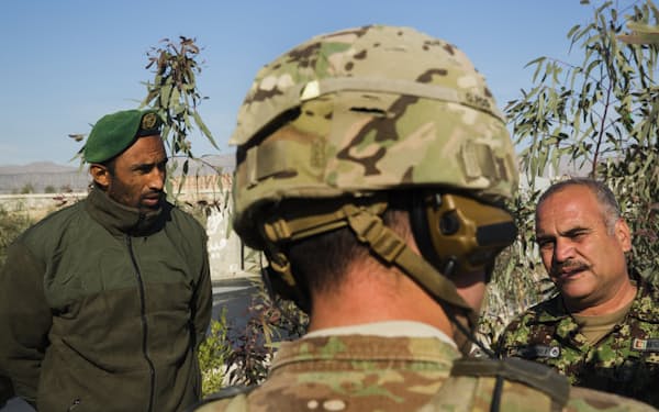 米軍に協力したアフガニスタン人通訳らの第１陣が米国に到着した＝ロイター