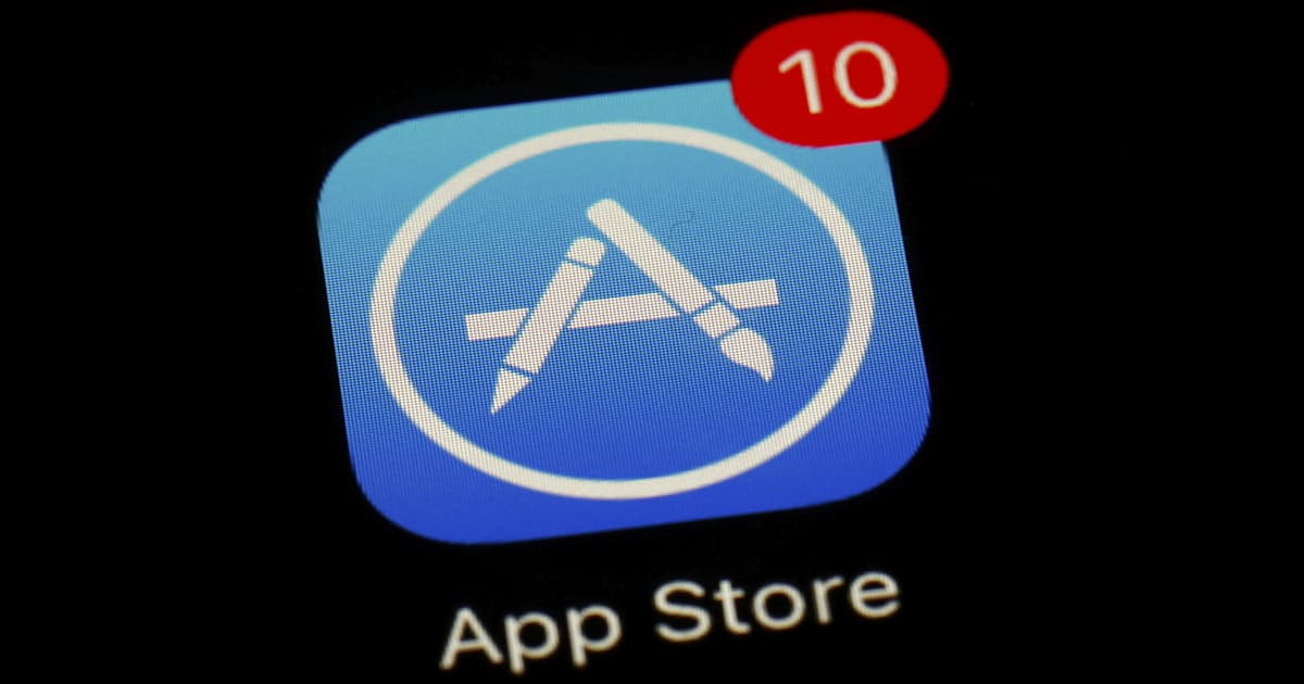 Apple、書籍などアプリ規約変更 日本の公取委調査受け(写真=AP)