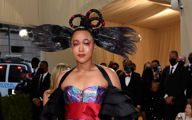 Naomi Osaka attends The Metropolitan Museum of Art's Costume Institute benefit gala celebrating the opening of the "In America: A Lexicon of Fashion" exhibition on Monday, Sept. 13, 2021, in New York. (Photo by Evan Agostini/Invision/AP) Naomi Osaka attends The Metropolitan Museum of Art's Costume Institute benefit gala celebrating the opening of the "In America: A Lexicon of Fashion" exhibition on Monday, Sept. 13, 2021, in New York. (Photo by Evan Agostini/Invision/AP)