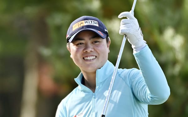 練習ラウンドで笑顔を見せる笹生優花(3日、瀬田GC)=共同