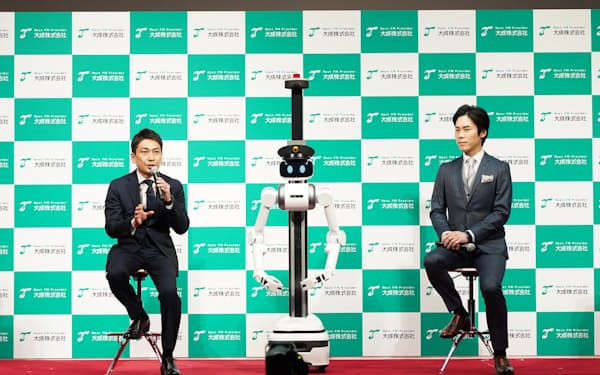 大成とユーゴーは事業戦略発表会を開いた（左から加藤副社長、松井ＣＥＯ）