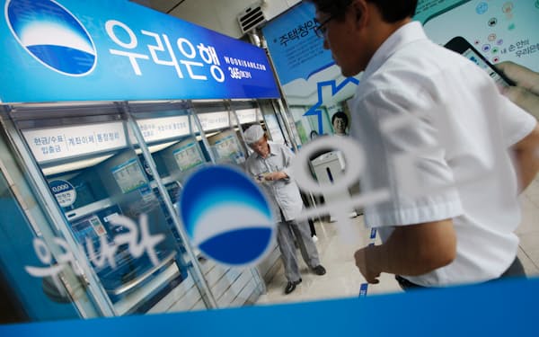 韓国政府はウリ金融の持ち分を段階的に減らしてきた＝ロイター