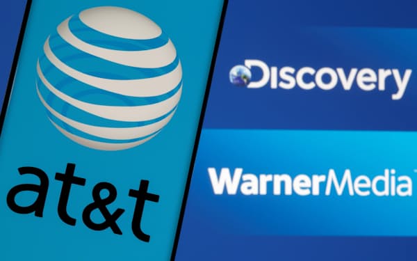AT&T logo is seen on a smartphone in front of displayed Discovery and Warner Media logos in this illustration taken May 17, 2021. REUTERS/Dado Ruvic - RC2XHN9GW23S