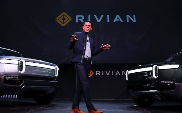 R.J. Scaringe, Rivian's 35-year-old CEO, introduces the world to his company's  R1T all-electric pickup and all-electric R1S SUV at the Los Angeles Auto Show in Los Angeles, California, U.S. November 27, 2018.  REUTERS/Mike Blake - RC1201750DE0