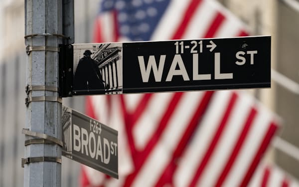 Street signs at the intersection of Wall and Broad Streets are shown in lower Manhattan, Wednesday, Oct. 13, 2021. Stocks are opening lower on Wall Street Monday, Oct. 18, 2021, as the market's momentum slows following its best week since July. (AP Photo/John Minchillo, File)