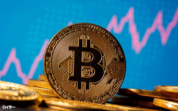 FILE PHOTO: A representation of virtual currency bitcoin is seen in front of a stock graph in this illustration taken November 19, 2020. REUTERS/Dado Ruvic/Illustration/File Photo