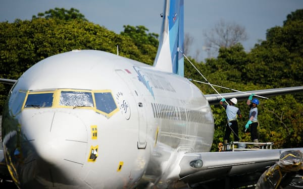 インドネシア政府は４日にすべての国からの国際線受け入れを再開した（ガルーダ・インドネシアの航空機）＝ロイター