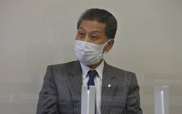 21年12月期決算を発表する、ワールドHDの伊井田社長（北九州市）