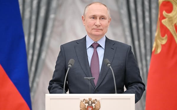 　22日、モスクワで記者会見に臨むロシアのプーチン大統領（タス＝共同）