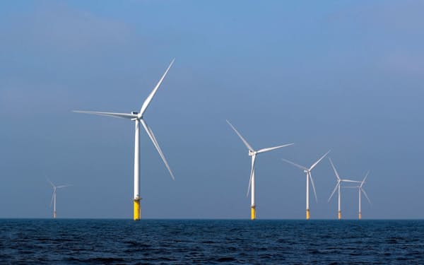 FILE PHOTO: Power-generating windmill turbines are seen at the Eneco Luchterduinen offshore wind farm near Amsterdam, Netherlands September 26, 2017.   REUTERS/Yves Herman/File Photo