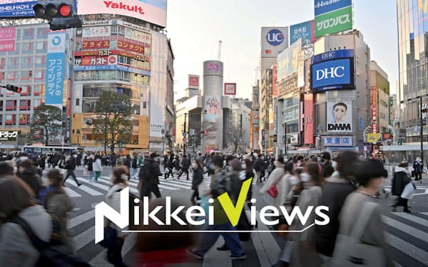 東京・渋谷のスクランブル交差点をマスク姿で歩く人たち（２月８日）