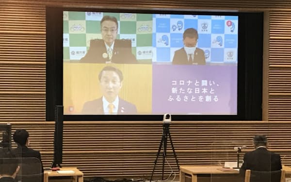 全国知事会の平井会長（画面左下）は基本的な感染対策の徹底を改めて呼びかけた（23日）