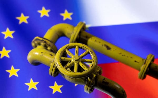 FILE PHOTO: A 3D printed Natural Gas Pipes are placed on displayed EU and Russian flags in this illustration taken, January 31, 2022. REUTERS/Dado Ruvic/File Photo