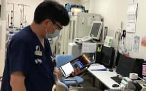 救急隊から患者のバイタルサイン(心電図、血圧など)が病院に送られてくる(弘前大学の高度救命救急センター)