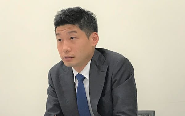 トリプルアイズの山田雄一郎代表（31日、東京証券取引所）