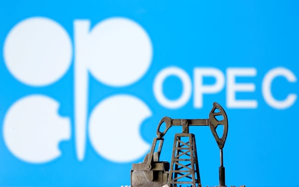 A 3D printed oil pump jack is seen in front of displayed Opec logo in this illustration picture, April 14, 2020. REUTERS/Dado Ruvic/Illustration - RC2K4G9DHPT9