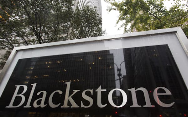 A sign for The Blackstone Group L.P. investment firm stands in front of their offices, Monday, Oct. 15, 2018, in New York. (AP Photo/Mark Lennihan)