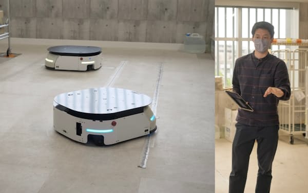 LexxPlussが開発する自律走行搬送ロボットは、約50台を一括管理してものを運べる。右写真はLexxPluss代表の阿蘓将也氏がタブレット上でAMRを管理する様子（写真：加藤康）