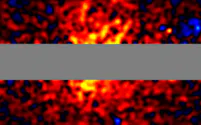 天の川銀河(グレーの横線)を覆うようにガンマ線(赤)が存在。理論上の暗黒物質の分布と似ている=東京大学の戸谷友則教授提供