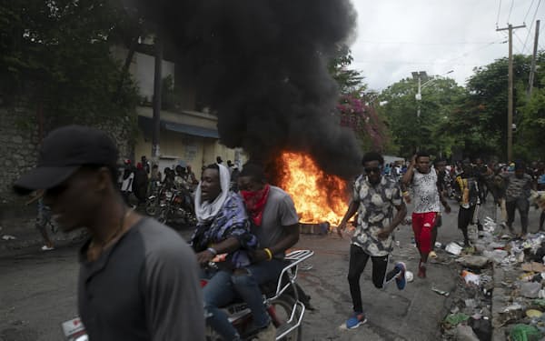 ハイチは物価高騰と燃料不足の経済危機に見舞われ治安が悪化している（22日、ポルトープランス）＝ＡＰ