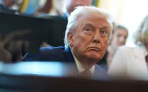 トランプ米大統領は国防権限法案に署名した=AP トランプ米大統領は国防権限法案に署名した=AP