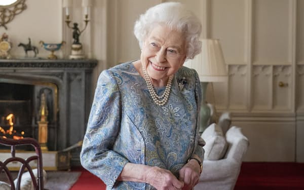 FILE - Britain's Queen Elizabeth II smiles while receiving the President of Switzerland Ignazio Cassis and his wife Paola Cassis during an audience at Windsor Castle in Windsor, England, Thursday, April 28, 2022. Queen Elizabeth II, Britain’s longest-reigning monarch and a rock of stability across much of a turbulent century, has died. She was 96. Buckingham Palace made the announcement in a statement on Thursday Sept. 8, 2022.(Dominic Lipinski/Pool Photo via AP, File)