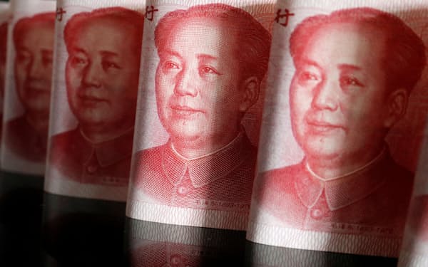 FILE PHOTO: Chinese yuan banknotes are seen in this illustration picture taken April 25, 2022. REUTERS/Florence Lo/Illustration/File Photo