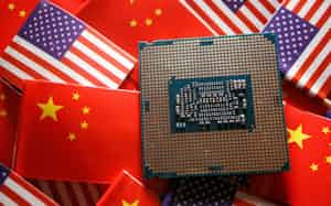FILE PHOTO: A central processing unit semiconductor chip is displayed among flags of China and U.S., in this illustration picture taken February 17, 2023. REUTERS/Florence Lo/Illustration/File Photo FILE PHOTO: A central processing unit semiconductor chip is displayed among flags of China and U.S., in this illustration picture taken February 17, 2023. REUTERS/Florence Lo/Illustration/File Photo