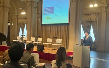 「文化体験による健康影響予測評価」をテーマに講演する京都大の近藤教授(20日、大阪市)