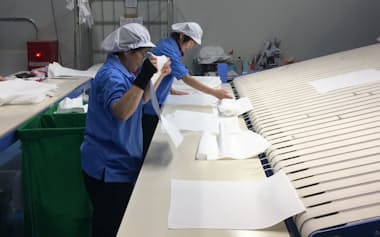 パートには1時間あたりの個人の目標枚数が定められている=ヤマシタ提供