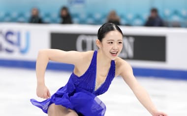 女子フリー 演技する青木祐奈(23日、北京)=共同