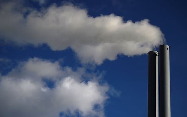 FILE PHOTO: General view of smoke coming from a chimney of an energy plant in Dublin, Ireland, September 24, 2018. REUTERS/Clodagh Kilcoyne/File Photo