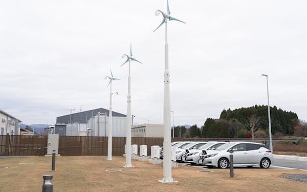 日産自動車は福島県浪江町で人工知能（AI）を使い、ＥＶの充電にかかる電気代を下げる実証実験を進めている＝同社提供