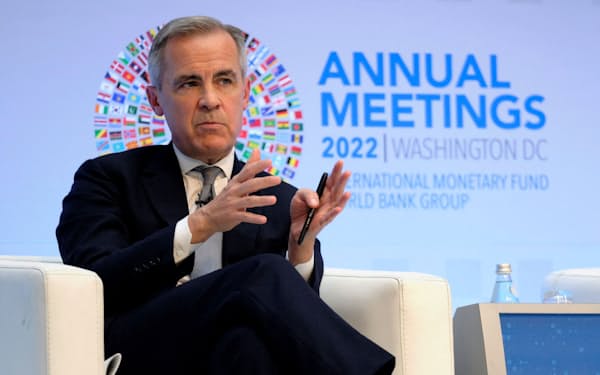 FILE PHOTO: Brookfield Asset Management Vice Chairman and former Bank of England Governor Mark Carney speaks during a panel discussion at the headquarters of the International Monetary Fund during the Annual Meetings of the IMF and World Bank in Washington, U.S., October 13, 2022. REUTERS/James Lawler Duggan/File Photo