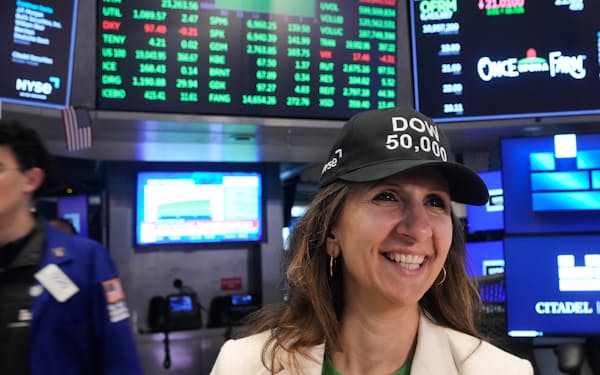 NYSE President Lynn Martin wears a "DOW 50,000" cap to watch closing bell ceremonies as the Dow Jones industrial average closed above the 50,000 level for the first time, Friday, Feb. 6, 2026. (AP Photo/Richard Drew)