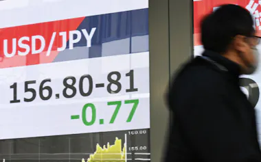 1ドル=156円台後半で推移する外国為替市場(9日午前、東京都中央区)