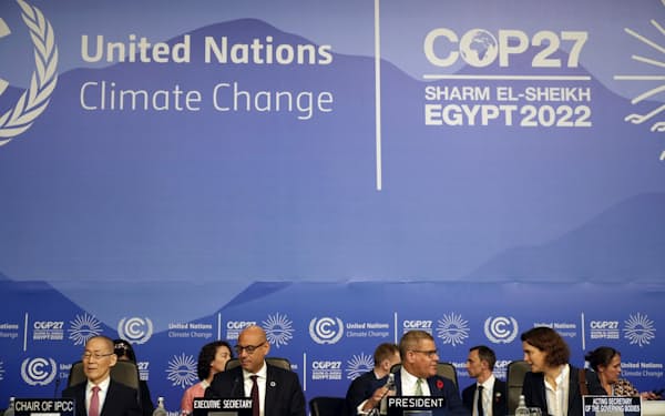 Leaders of the U.N. climate conference, from left, Dr. Hoesung Lee, chair of the IPCC (Intergovernmental Panel on Climate Change), Simon Stiell, U.N. climate chief, and Alok Sharma, president of the COP26 climate summit, attend the opening session at the COP27 U.N. Climate Summit, Sunday, Nov. 6, 2022, in Sharm el-Sheikh, Egypt. (AP Photo/Peter Dejong)