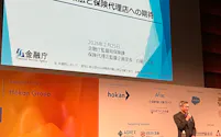 講演する金融庁・保険代理店監督企画室室長の白藤文祐(2月25日、東京都港区)