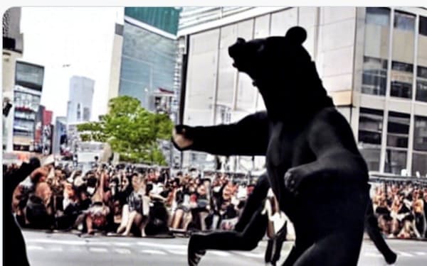 ｒｉｎｎａが提供している画像生成サービスで、筆者が「黒い熊が東京の街角で並んでダンスを踊る」とリクエストして生成された画像
