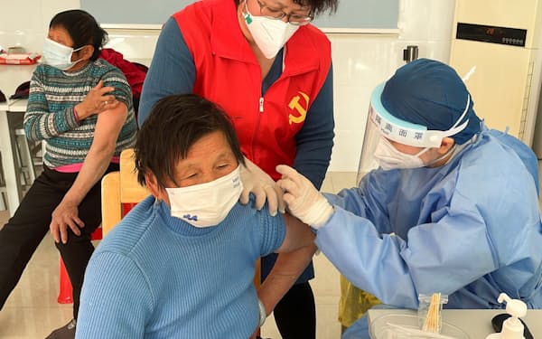 中国ではワクチン接種の拡大が不可欠に=ロイター