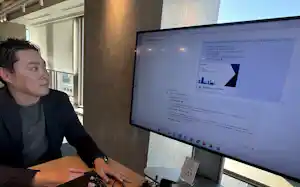 三井不動産で「本部長AIエージェント」とやりとりする社員(イメージ) 三井不動産で「本部長AIエージェント」とやりとりする社員(イメージ)