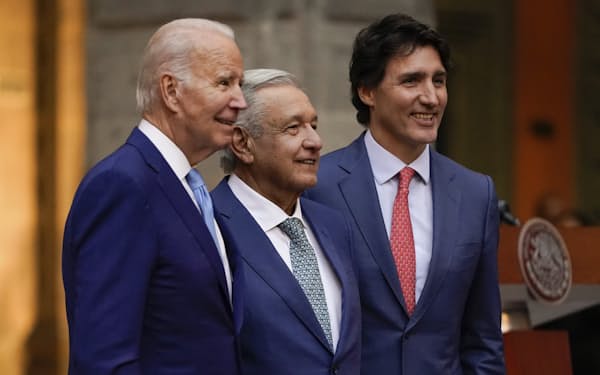 President Joe Biden, Mexican President Andres Manuel Lopez Obrador, and Canadian Prime Minister Justin Trudeau pose for a photo as they participate in a news conference at the 10th North American Leaders' Summit at the National Palace in Mexico City, Tuesday, Jan. 10, 2023. (AP Photo/Andrew Harnik)