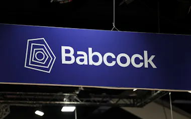 A Babcock logo is displayed above a stand on the first day of the Indo Pacific International Maritime Exposition in Sydney, Australia, November 4, 2025. REUTERS/Hollie Adams
