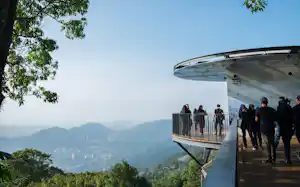 Visitors take in a sweeping vista from a viewing platform on Penang Hill, one of the Malaysian island's most popular tourist destinations. (All photos by Kit Yeng Chan) Visitors take in a sweeping vista from a viewing platform on Penang Hill, one of the Malaysian island's most popular tourist destinations. (All photos by Kit Yeng Chan)