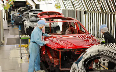 地政学リスクが高まるなかで対応が注目される(トヨタ自動車九州の生産ライン、福岡県宮若市)