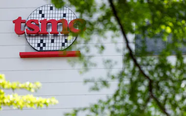 FILE PHOTO: FILE PHOTO: The TSMC logo is displayed on a building in Hsinchu, Taiwan April 15, 2025. REUTERS/Ann Wang/File Photo/File Photo/File Photo