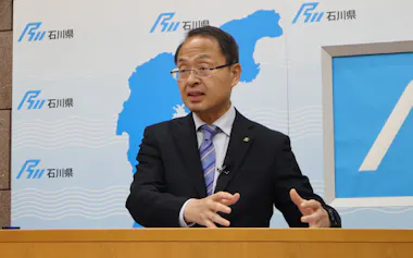 記者会見する山野知事(14日、石川県庁)