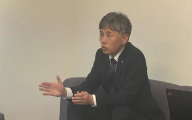 田中英一郎社長は記者会見で「開発中止は残念だが、EV関連技術を手の内化できた」と話した(14日、富山市)