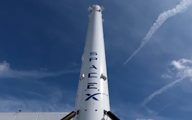FILE PHOTO: The SpaceX Falcon 9 rocket booster is shown outside the company's facility in Hawthorne California, U.S., April 23, 2026. REUTERS/Mike Blake/File Photo