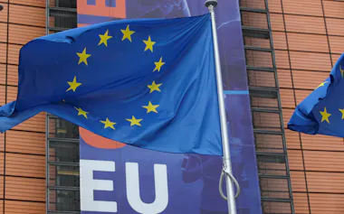 A European Union's flag flutters outside the European Commission headquarters in Brussels, Belgium October 15, 2020. REUTERS/Yves Herman